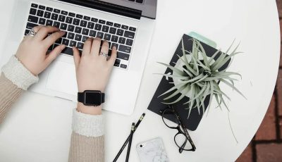 A Person Using A Laptop Computer