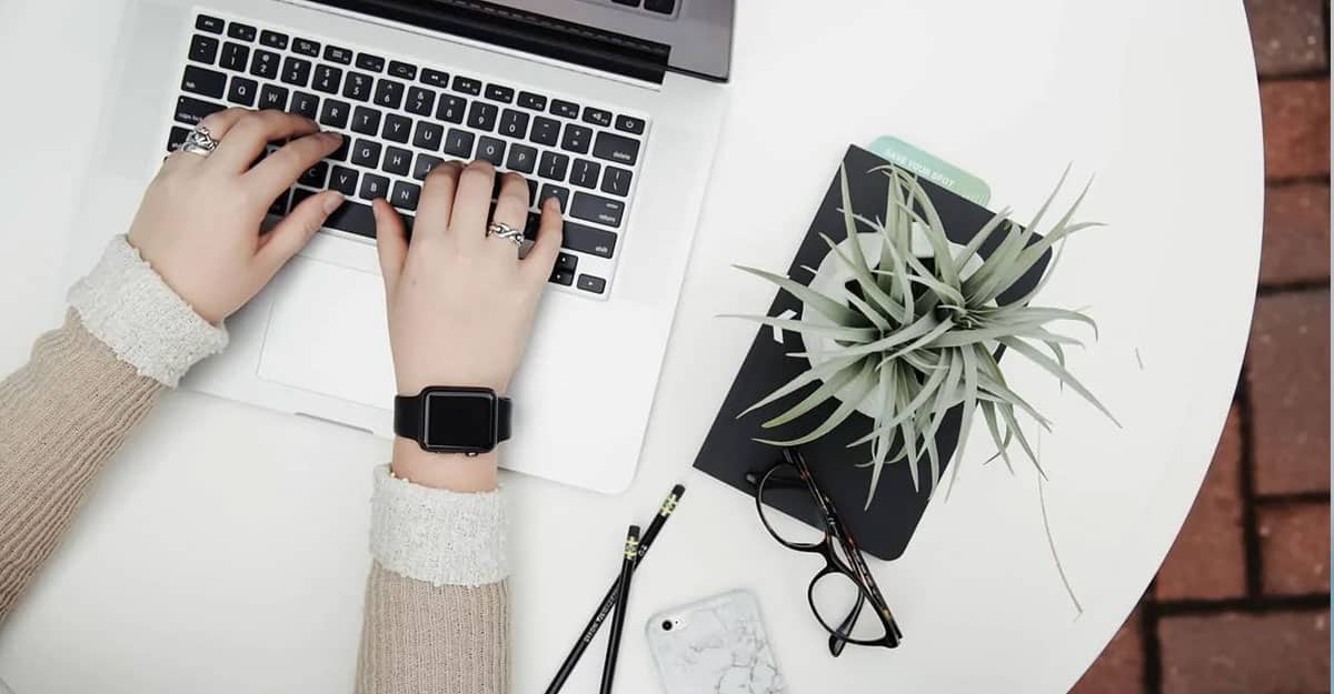 a person using a laptop computer