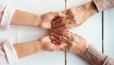 A Hand Holding A Knife